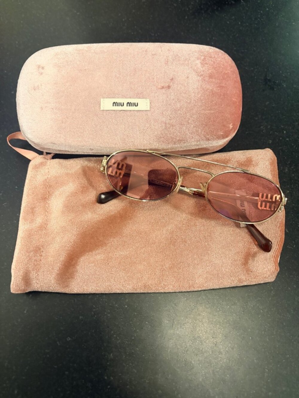 Miu Miu SMU 54Z Gold Oval Sunglasses